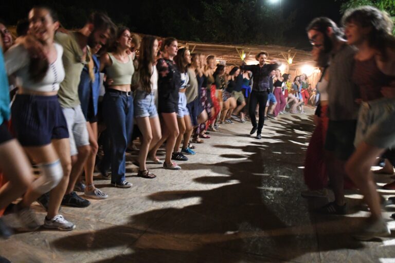 Dancewrs in two long lines CREDIT Hont Angela